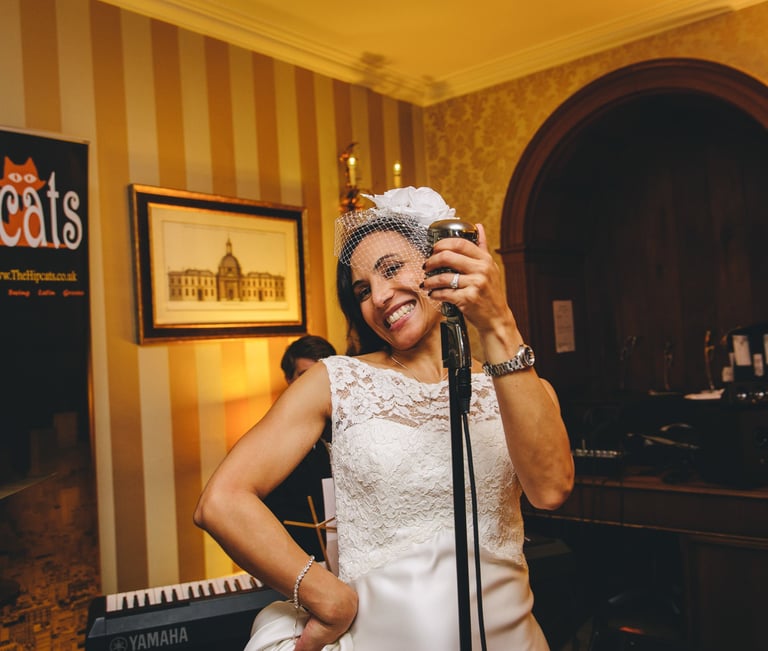 The Hipcats - bride at wedding chooses 1920s, 1930s, Gatsby jazz and swing band for wedding. Band for hire for vintage event