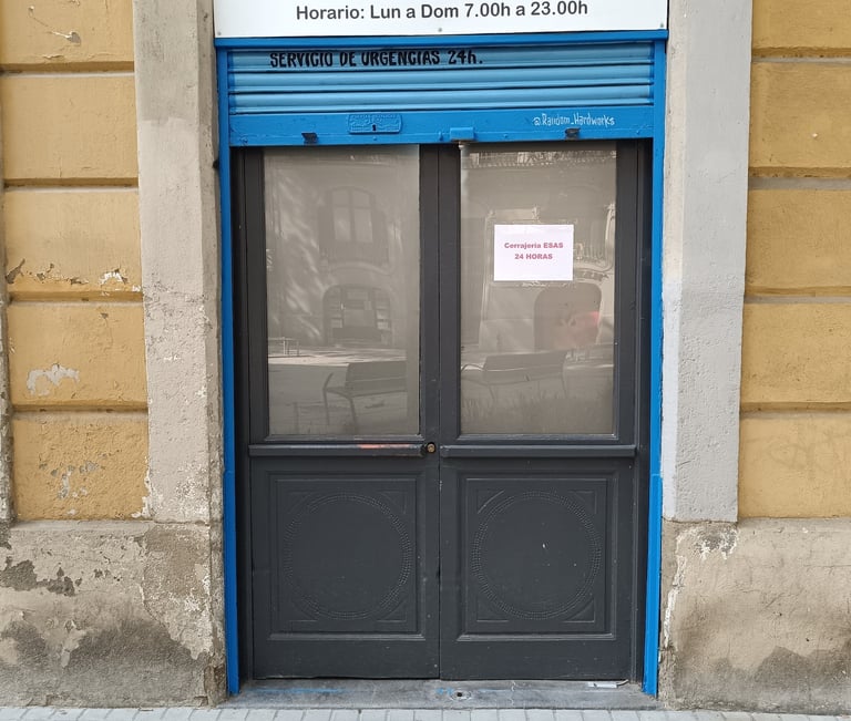 a blue door with a sign that says,