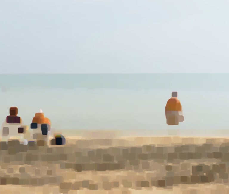 a group of people sitting on a beach