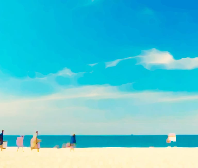 a beach with people standing on the sand
