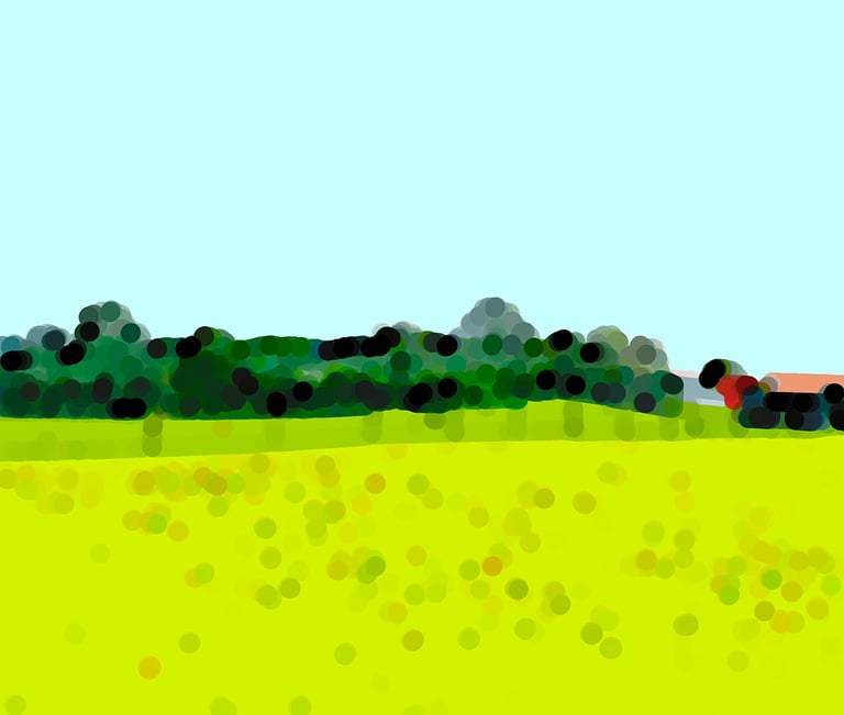 a field with a train on the tracks