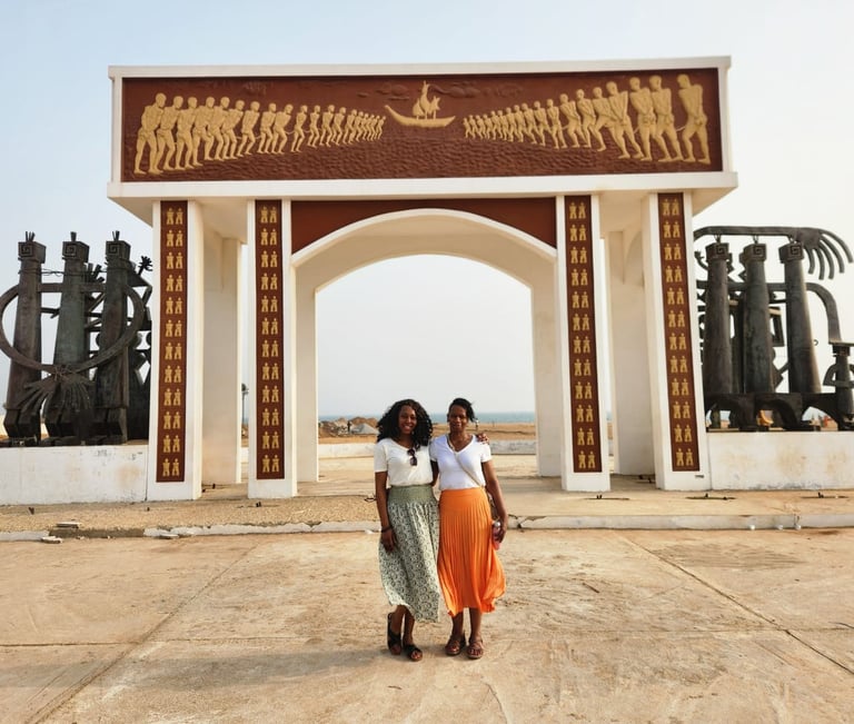 Tourists visiting Slave Door of No Return in Benin