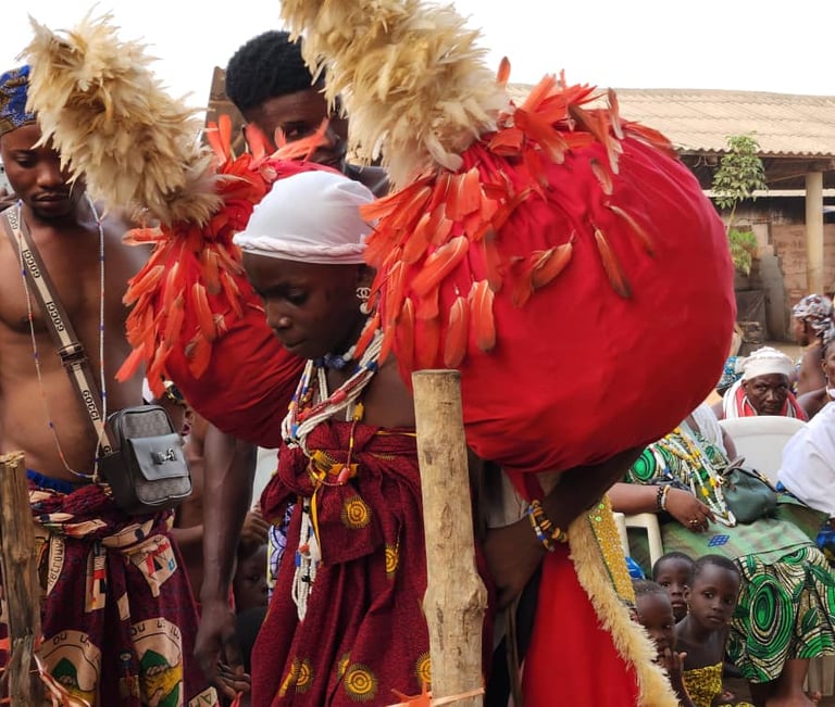 A young Beninese Voodoo Adept in Trance during the Voodoo Festival in Benin