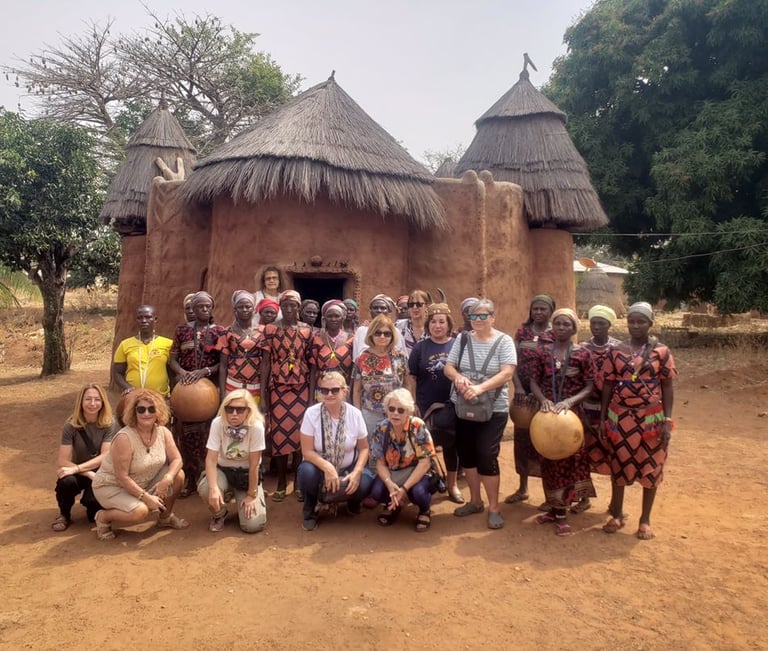 A group of Tourists visiting Tata Somba Village during a Multi-country Trips of Benin, Togo & Ghana