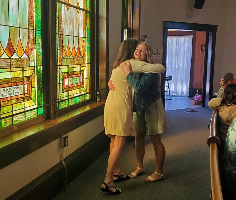 Moran KS_Shannon and Shelby embracing in a hug