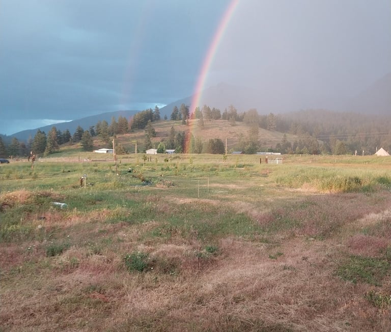 Double rainbow over the mountaons