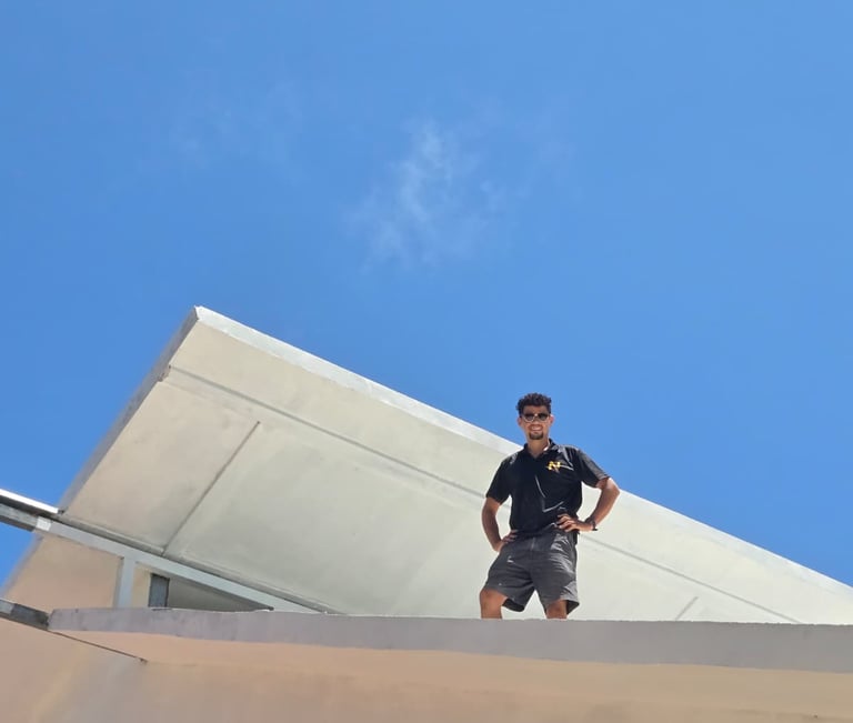 José Ponce, founder of Nance, overseeing construction work on a home roof in Samara, Guanacaste