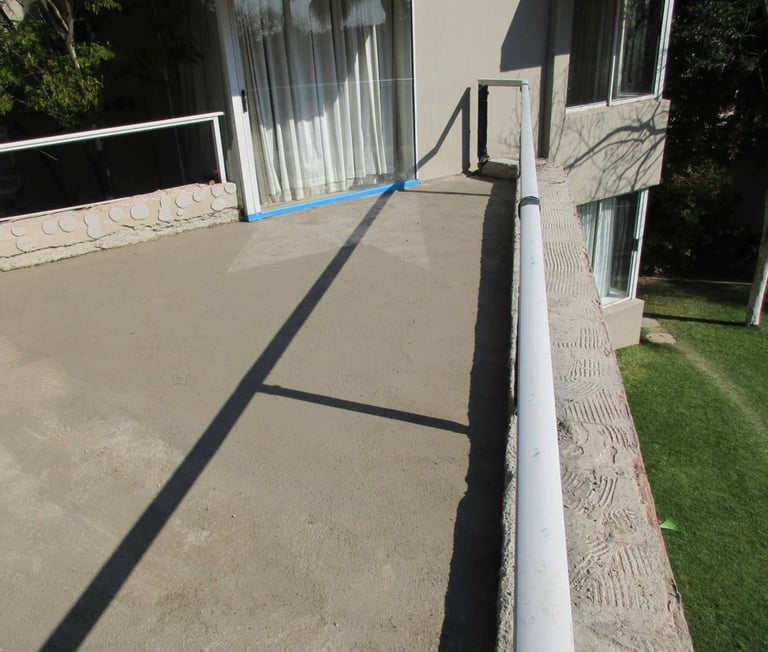Screed in state of cure at bedroom sliding door end. Fourways Gardens, Sandton