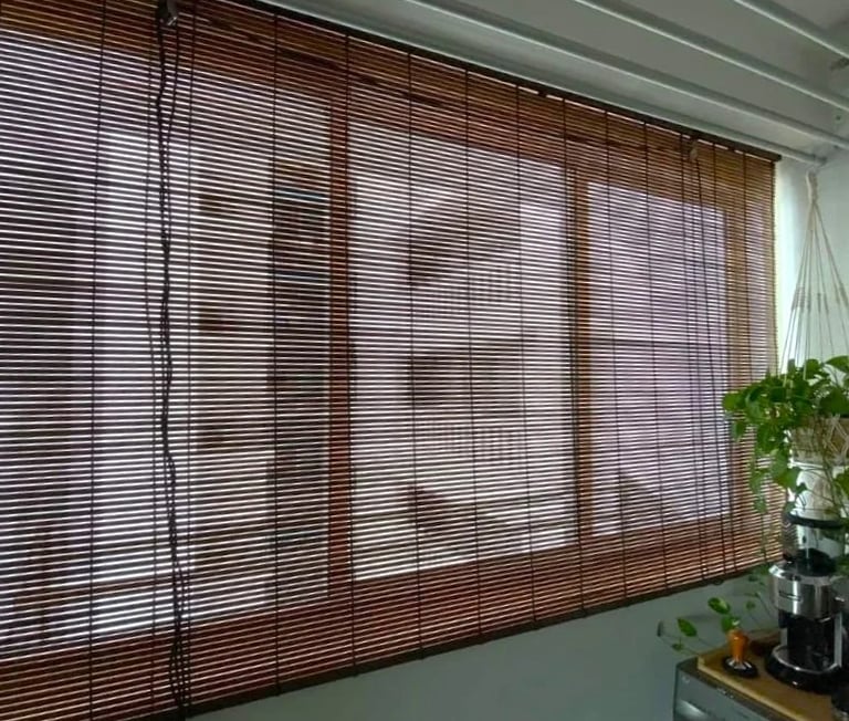 Bamboo blind installed in a room