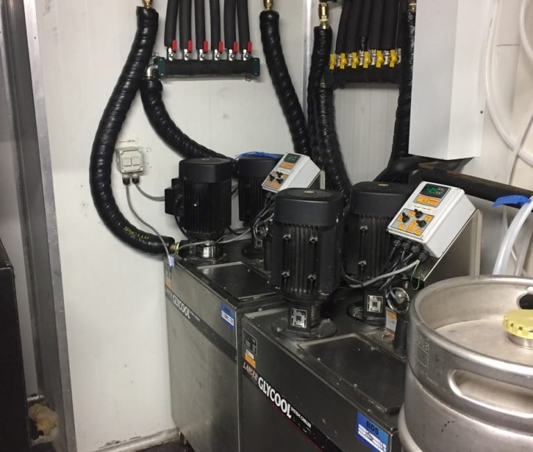 Lancer Glycool beer cooling system with insulated lines and pumps in a commercial draft setup.