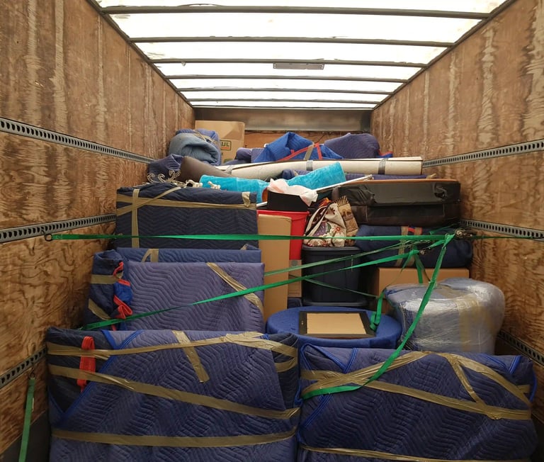 Canada's most wanted movers moving truck partially  full with safely packed items.