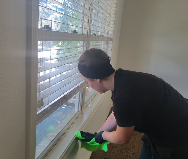 Woman Cleaning a Move in-Move out Organic Cleaning w/ King Organic Clean