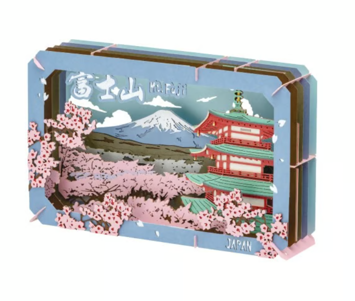 3D layered paper craft of Mount Fuji with a red pagoda and pink cherry blossoms in Japan.