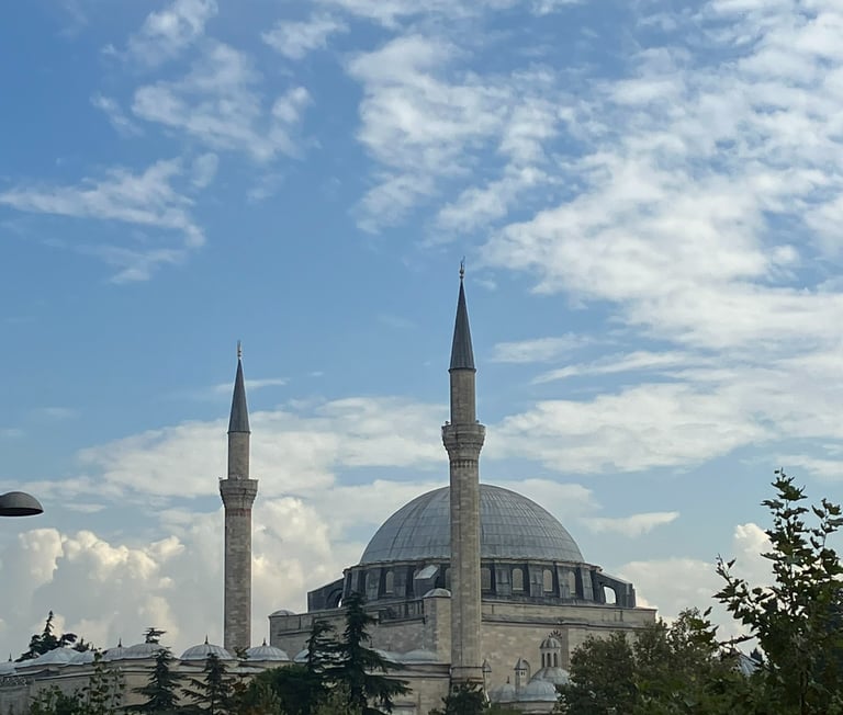 a mosque with a blue sky in the background