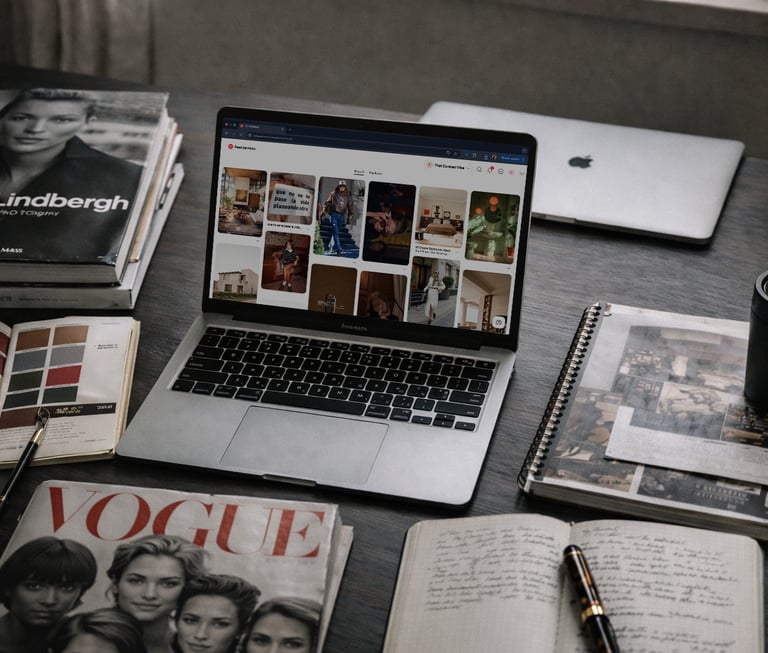 Editorial workspace for That Curated Vibe blog featuring fashion inspiration magazines, design notes