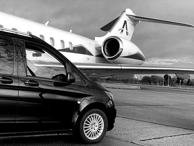 car next to an aiplane