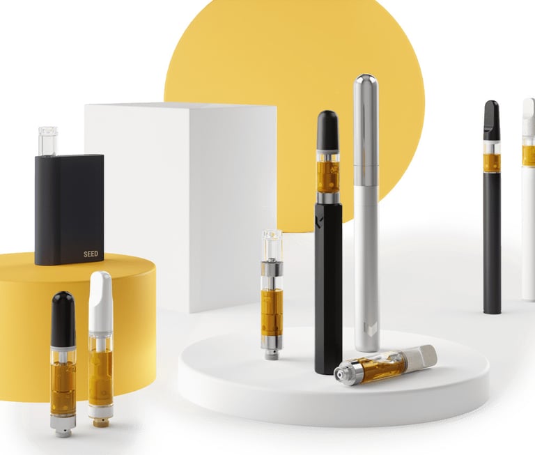 A collection of cannabis oil vape cartridges and battery pens on white and yellow displays.