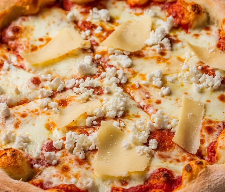 A Four Cheese Pizza with a perfectly baked crust, golden and crisp. 