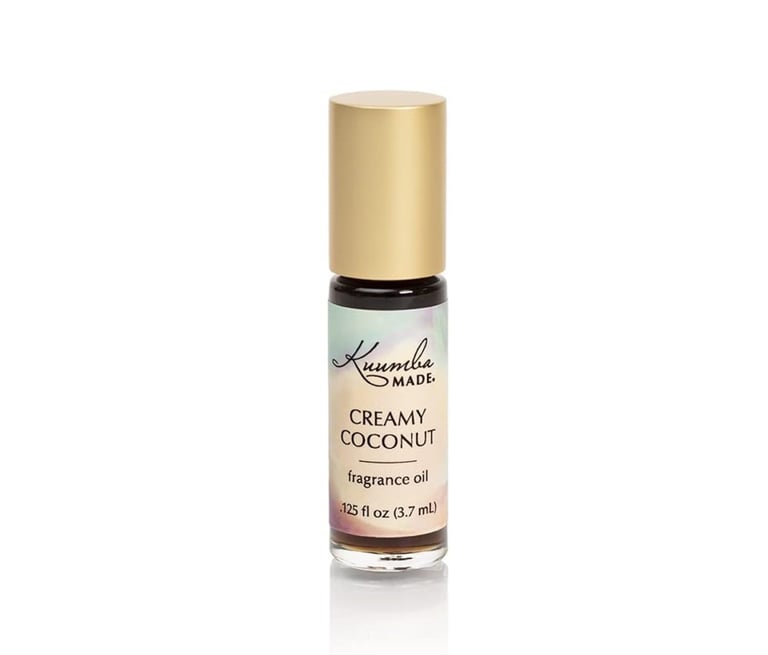 a bottle of creamy coconut oil with a gold cap