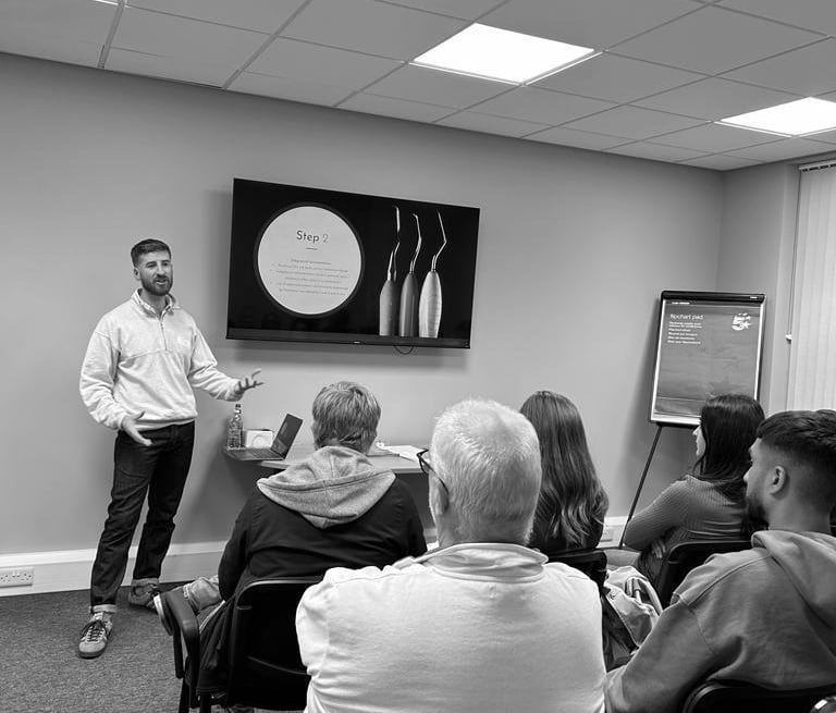 Fergus Machin teaching dentists about periodontitis