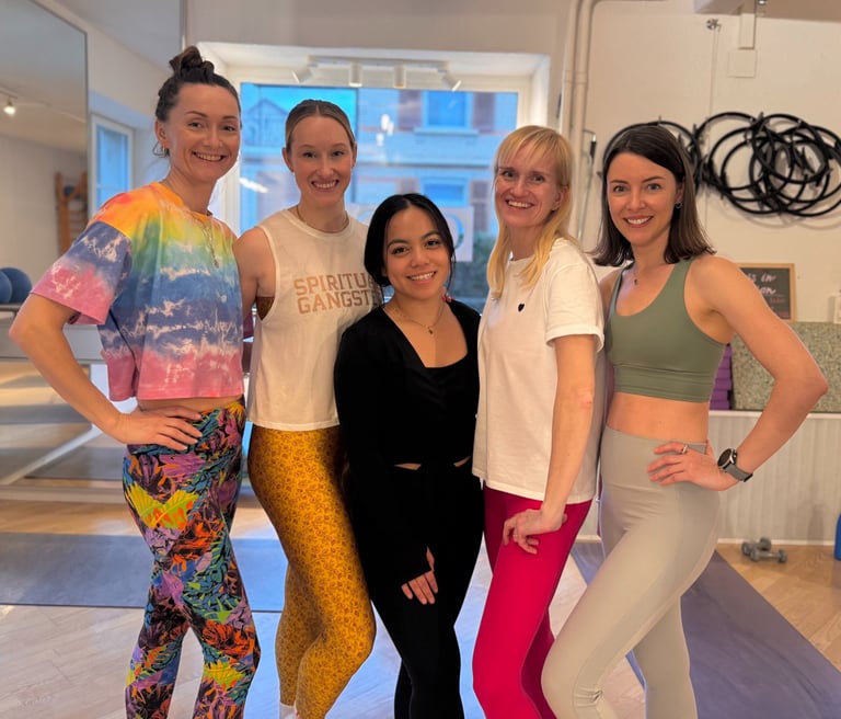 Barre teachers leading low-impact workouts at Joy Movement Studio in Meilen