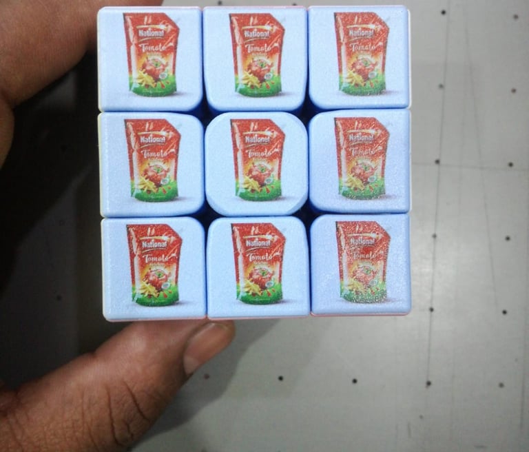 Intricate UV printing on small cubes for corporate promotional items