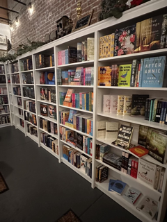 A book shelf in the back of Marigolds bookstore