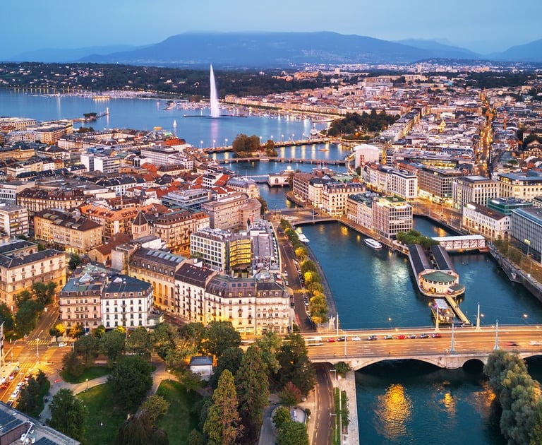 An aerial view of the financial district of central Geneva, with Lac Leman and the big fountain