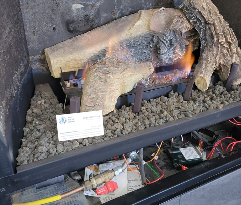 blue flame works repairing a  fireplace