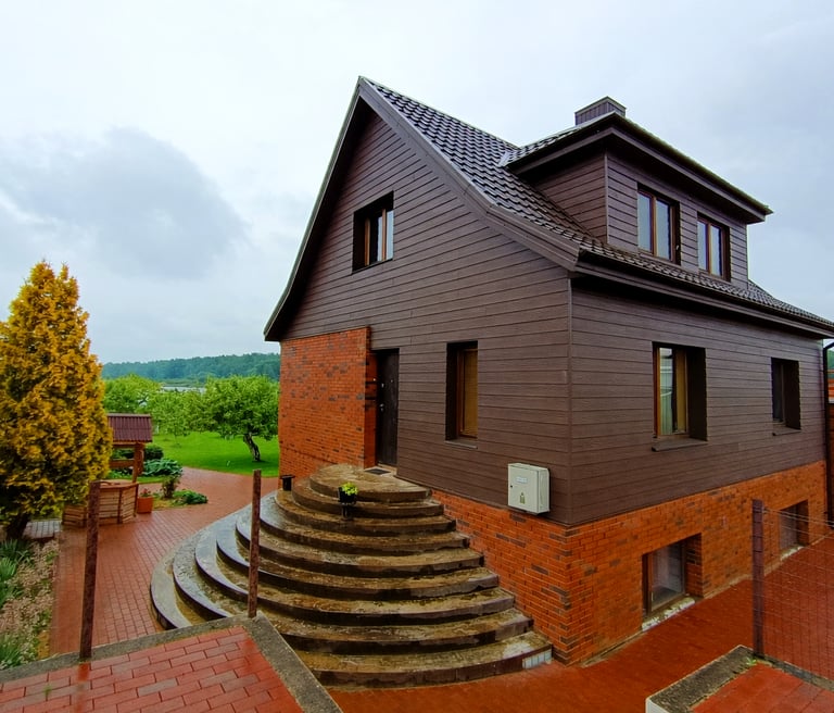 Cedral dailylenčių fasadas