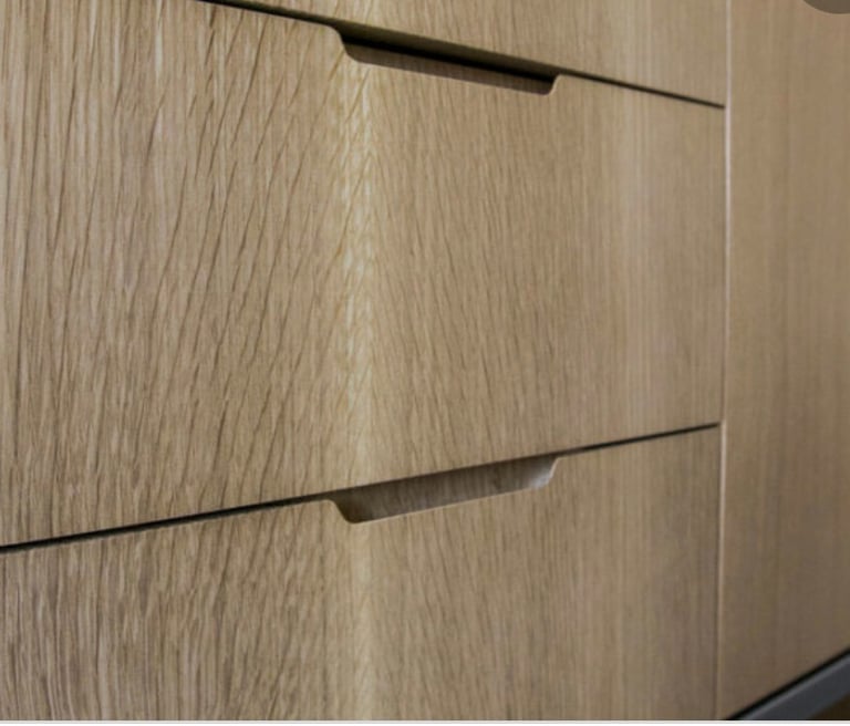 Close up detailed view of custom created closet drawers.