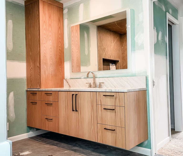 Unusually shaped custom built bathroom vanity for a Pearce Woodworks Detroit client.