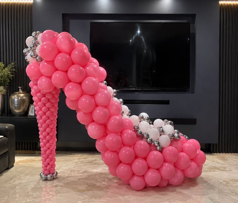 Barbie pink high heel themed birthday balloon display for children’s party in Liverpool