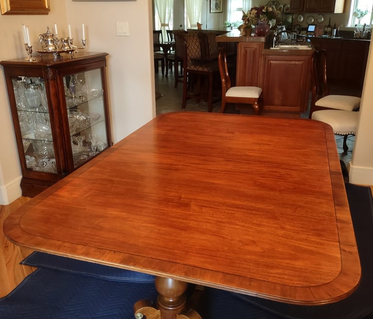 Restored maple dining table that was in the back yard for 10 years. They raised two families on it.