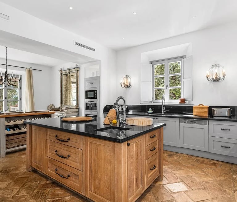 Kitchen view with island and wooden floors at Finca Santa Katerina