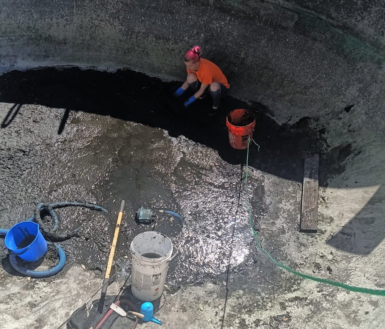 Hand Digging to Remove Mud