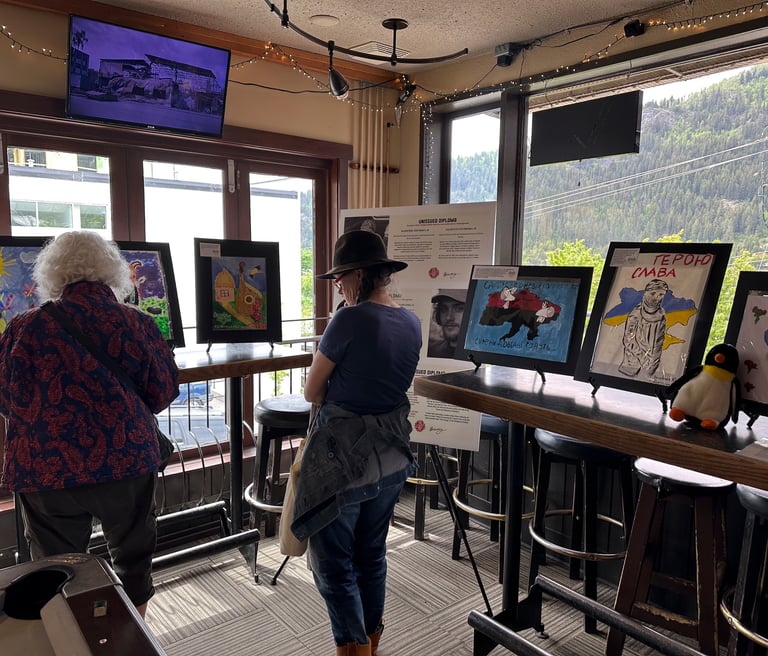 exposition with paintings created by kids in the Ukrainian war shown in Canada