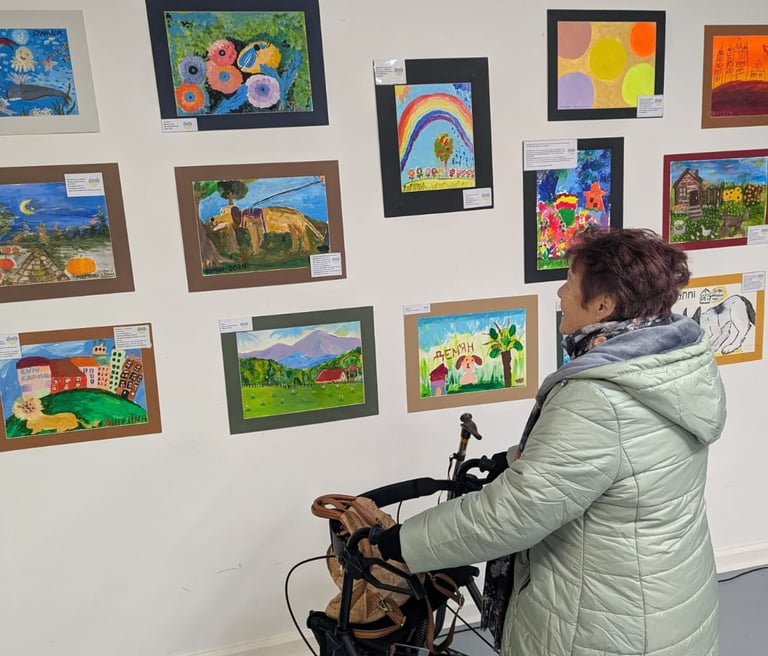 person looking at the artwork