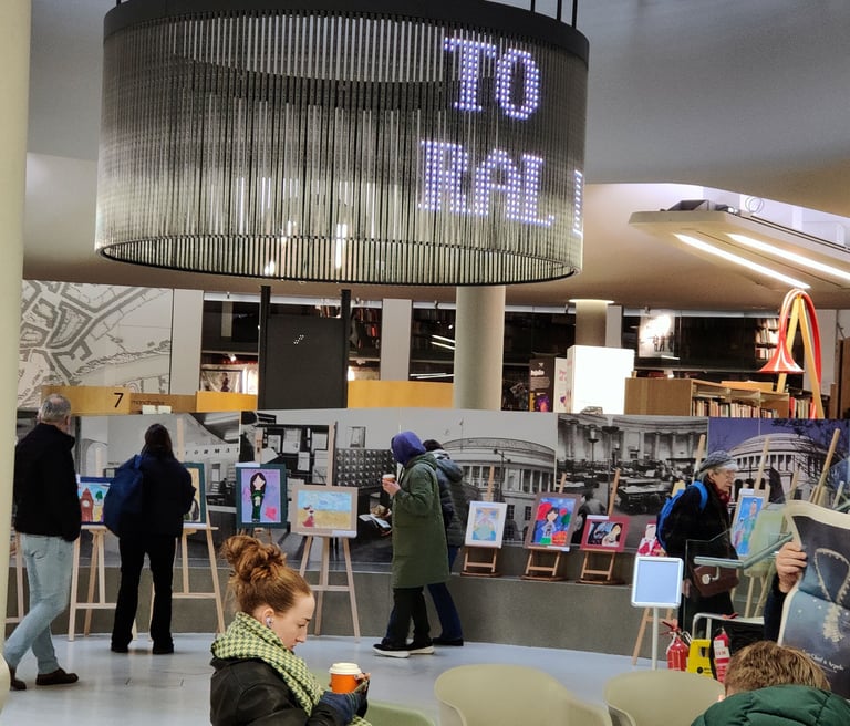 People looking at the artwork