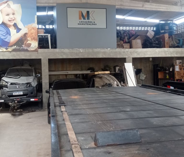 a car parked in a garage with a car parked in the garage