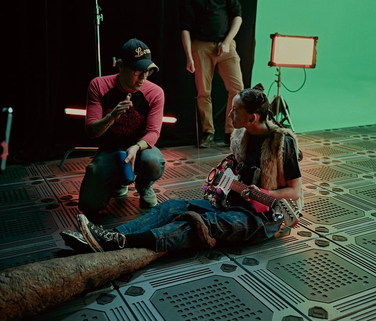 Director Javier Badillo speaks with actress Sofia Skates during the filming of a scene