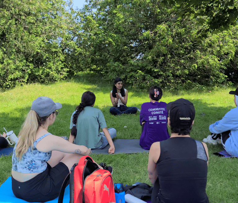 Rio leading an in-person group workshop