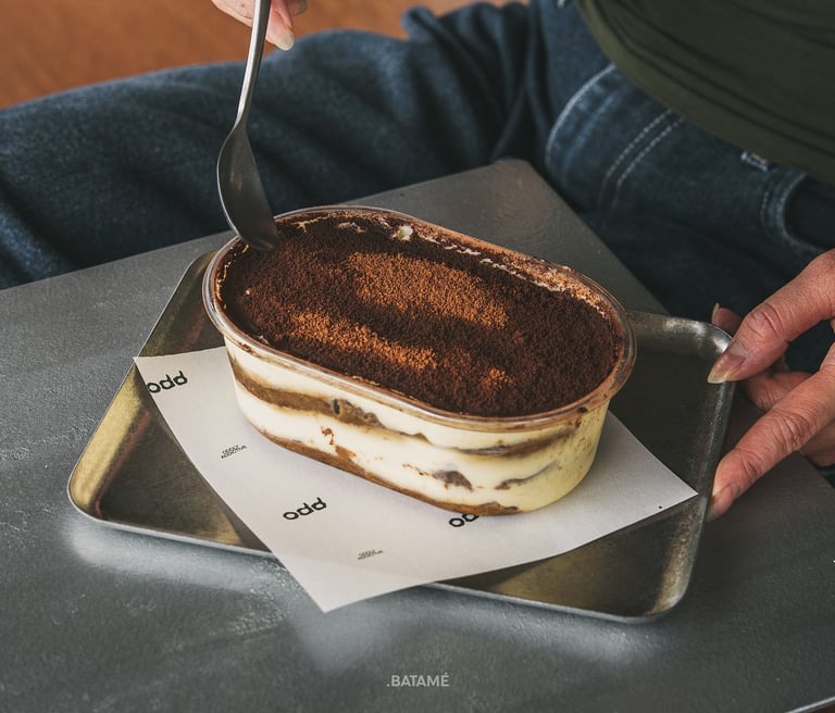 a large portion of tiramisu at odd Batam