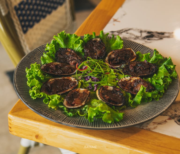 Blood cockles grilled in Jimbaran Sauce at SeeSea by Nomad Batam