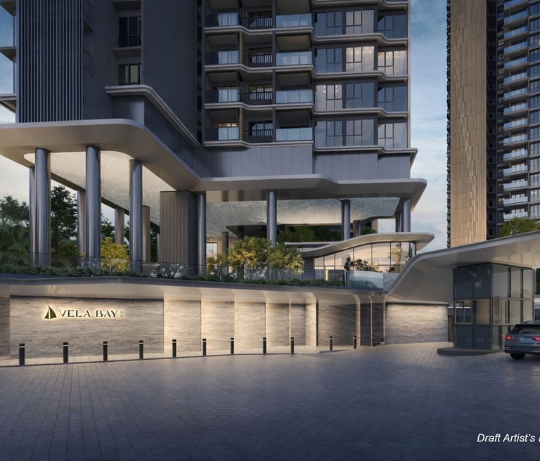 Modern luxury condominium entrance at Vela Bay with sleek architectural design and evening lighting.