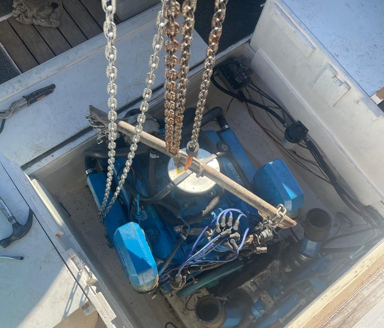 Mobile boat mechanic performing engine diagnostics on a pontoon boat in Niagara Falls.