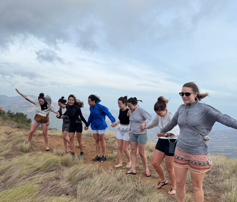 People enjoying mountain views and tropical scenery at Rainforest Yasmin Inn, Santa Fe, Panama.