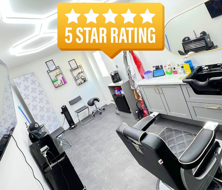 Interior of YAU Barber Studio featuring modern barber chairs, clean setup, and a 5 star rating badge.