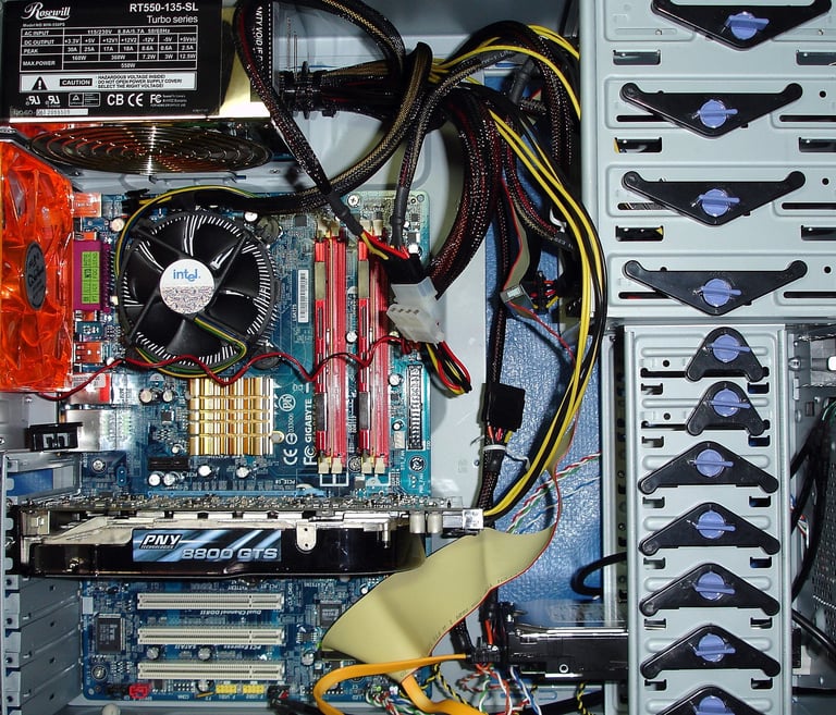 a computer case with a computer, highlighting repairs and tech support