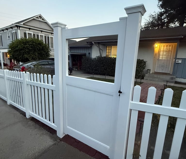 Custom white picket fence and gate